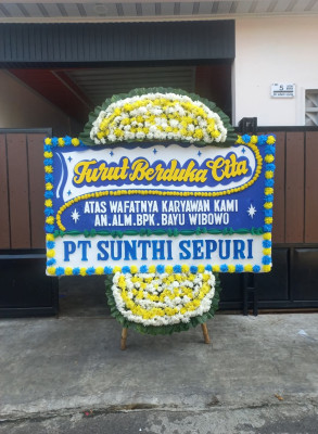 Papan Bunga Duka di Tiom Ollo
