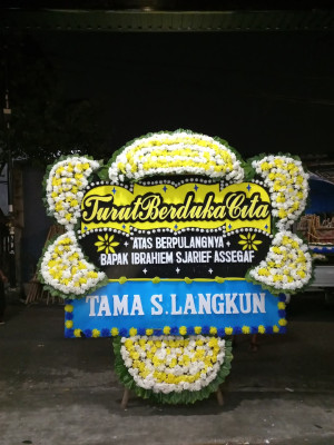 Papan Bunga Duka di Tiom Ollo