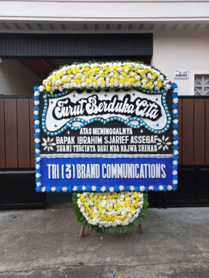 Papan Bunga Duka di Tiom Ollo